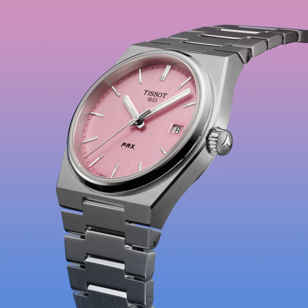 Elegant silver wristwatch with a pink dial and metal band.