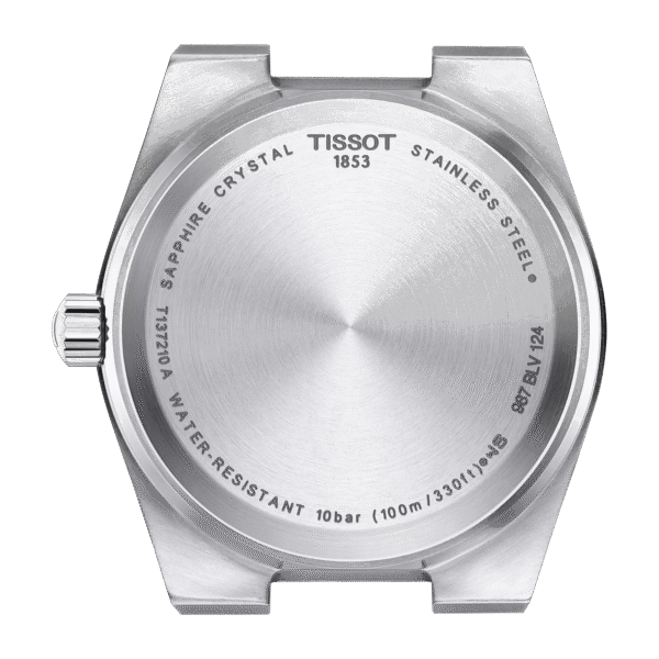 Back of a silver Tissot watch case showing engravings and crown.